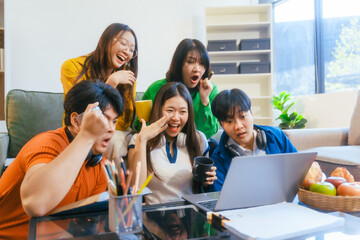 Five young Asian students engage in online study on campus, collaborating on research, projects. They help each other with assignments, gaining valuable experience and preparing for future careers.