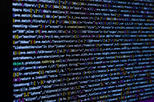 TitleSoftware source code. Programming code. Programming code on computer screen. Developer working on program codes in office. Source code