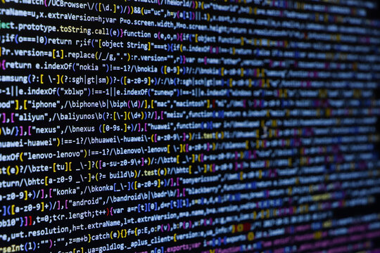TitleSoftware source code. Programming code. Programming code on computer screen. Developer working on program codes in office. Source code