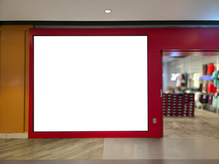 billboard mockup in modern shopping mall, blank advertising signage on red storefront for commercial branding and marketing, urban retail design with illuminated store background