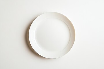Empty white oval plate on white background