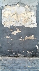 Obraz premium Weathered wall, cobblestone street. Background texture