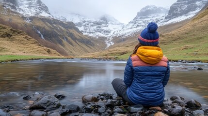 Serene Solitude: Woman Contemplating Majestic Mountain Landscape