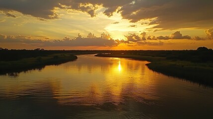 Obraz premium Vibrant Sunset Over Calm River