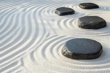 Selbstklebende Fototapeten a minimalist japanese zen garden viewed from above, with precise circular patterns raked in white sand surrounding smooth black stones © julija