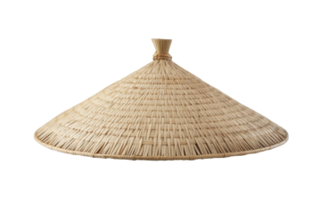 Tan straw hat with a woven design sits on a white background, isolated