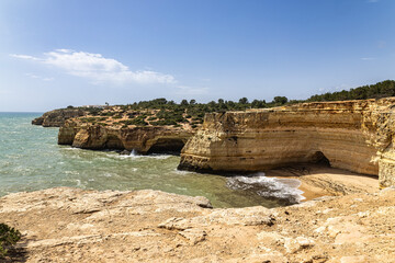 Portuguese coast in Benagil, Algarve, Portugal. Praia da Corredoura. Seven Hangging Valleys Trail.