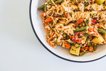 plant-based satay vermicelli noodle dish with veggies and tofu