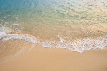 nature of the beach and sea Summer with sunshine, sandy beaches, clear blue waters sparkling against the blue sky. On an island with good ecology and environment Background for summer vacation