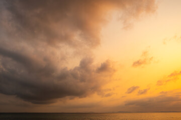 Enjoy panoramic views of the skyline . Sunset in the evening sky with colorful clouds and beautiful cloud patterns Amidst the soft golden light	