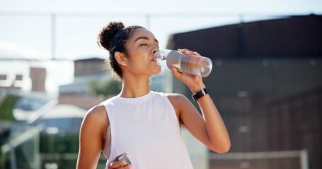 Sports athlete, hydration and woman drinking water for thirst, exercise break and liquid refreshment. Wellness, person and mineral drink outdoor for workout recovery, healthy body and cardio training