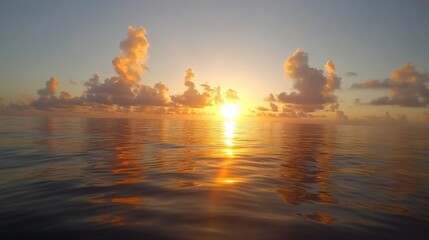 Vibrant Sunset Over Calm Ocean Waters