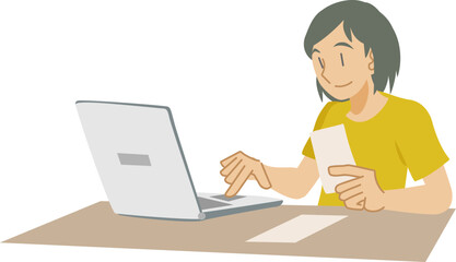 パソコンに買い物記録を入力する女性