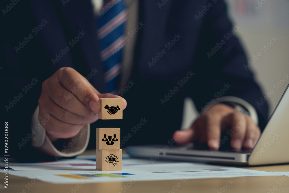 Poster partnership and teamwork concept, businessman holding wooden cube with icons handshake between man a