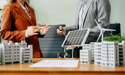 Business team people planning hand using laptop for working technology and business Net zero and...
