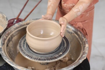 Hobby and craft. Girl making pottery indoors, closeup