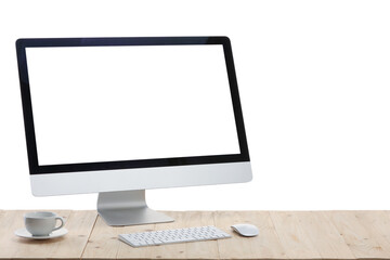 Fototapeta premium Computer monitor, keyboard, mouse and cup of drink on wooden desk against white background