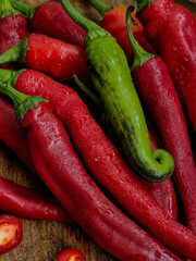 red and green chili peppers with water drops