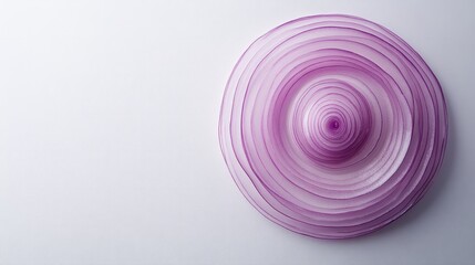 Obraz premium A thin slice of purple onion, its concentric rings clearly visible, isolated on a clean white background