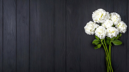 White flowers bouquet on dark wood background, copy space