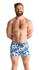 Fototapeta premium Smiling man wearing floral swim shorts while standing confidently isolated on transparent background (PNG)