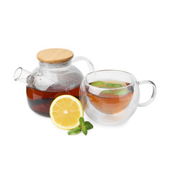 Tasty mint tea, lemon and fresh leaves isolated on white