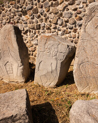 Building and wall of the dancers at the ancient archaeological ruins of Monte Alban in the Oaxaca...