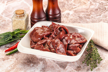 Raw uncokked chicken liver in the bowl