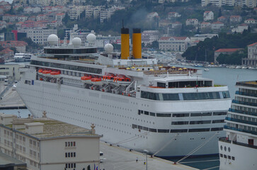 Classic cruiseship cruise ship liner Neo Classica docked in Dubrovnik, Croatia with island...