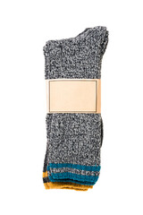 Top view of grey woolen winter socks on white background