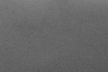 Wet and dry black fine grit sandpaper background backdrop. Do it youself decorating supplies concept
