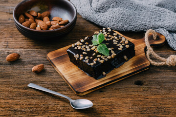 Brownies on wooden background