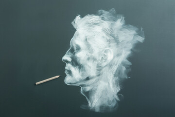 Fototapeta premium Artistic Chalk Sketch of a Mans Profile with Pencilon Dark Background