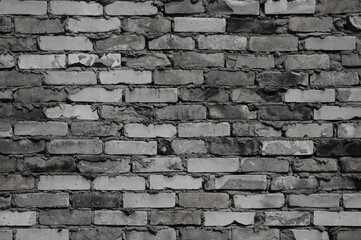 brick wall made of white and black brick close up