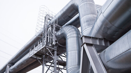 pipeline close-up against grey sky