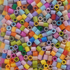 Plastic beads in a box
