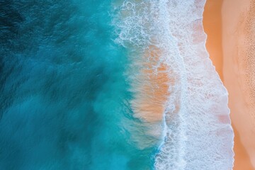 Breathtaking aerial view of peaceful sandy beach and gentle ocean waves showcasing natural beauty for seaside travelers and nature aficionados