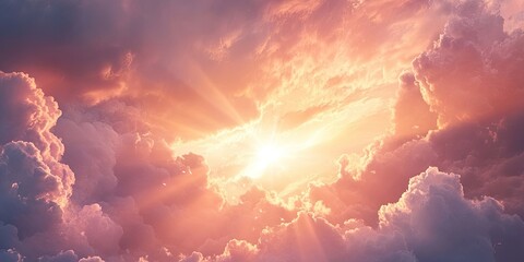 Fototapeta premium Radiant sunlight piercing through fluffy pastel clouds with golden and pink hues at the center creating a serene and uplifting atmosphere.