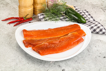 Red pickled herring fish fillet