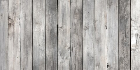 Fototapeta premium Weathered gray wood planks background showcasing a textured surface in shades of gray with grunge details positioned vertically across the image.