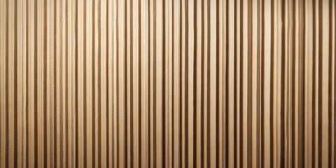 Textured corrugated cardboard backdrop featuring vertical beige and brown stripes, creating a warm, rustic surface ideal for photography and design.