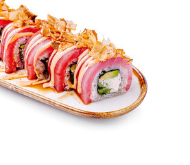 Elegant sushi roll with tuna, avocado, and bonito flakes