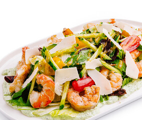 Fresh shrimp salad with vibrant vegetables and herbs served on plate