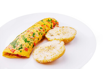 Delicious vegetable omelet served with seasoned potatoes