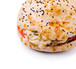 Delicious sandwich with sesame seed bun and fresh ingredients