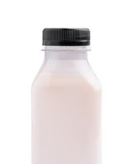 Fresh milk bottle on a white background captured in daylight