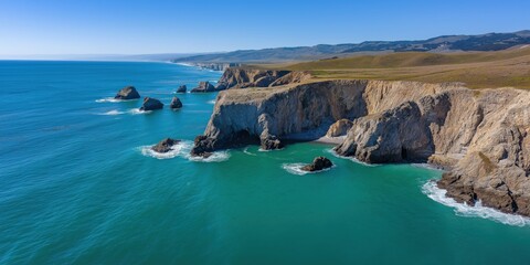 Rugged coastal cliffs overlooking turquoise ocean waters