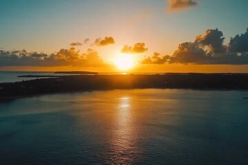 Obraz premium Tropical sunrise illuminates the horizon over serene waters and distant islands in a peaceful morning sky, Timelapse of a Beautiful tropical sunrise over the sea at Punta Cana, Dominican republic