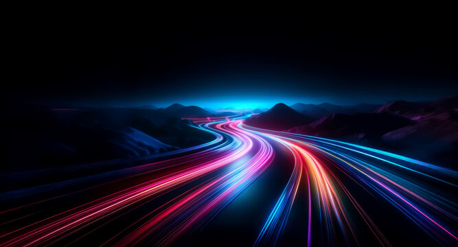 A vibrant road at night with light trails curving through a dark landscape.  Illuminated streaks of pink, blue, and purple create a dynamic and futuristic scene amidst distant mountains.