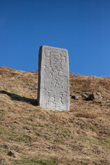 Columns and carved stone at the ancient ruins of Monte Alban in Oaxaca, Mexico.